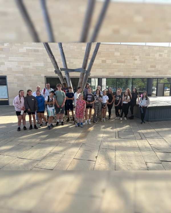 Photo of students stood in a group outside the residential centre