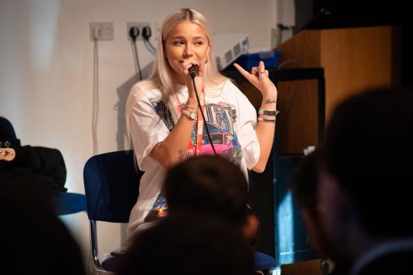 Photo of Sissy singing